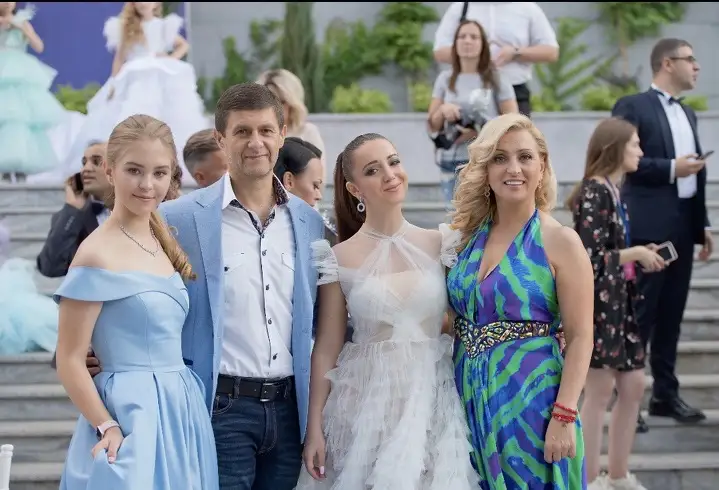 Anastasiia Bondarchuk with her parents (Nataliya and Sergiy Bondarchuk) and producer Elvira Gavrilova at “The Future of Ukraine Children” awarding ceremony