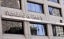 S&P: Обесценение тенге ограничит развитие банковского сектора РК 