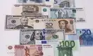 Тенге слабеет к доллару, рублю и юаню 