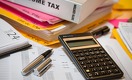 С 16 июля казахстанцам начнут списывать долги по налогам