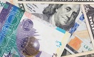 Доллар к вечеру частично отыграл потерянные у тенге позиции
