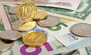 На какой отметке остановились доллар, евро и рубль на вечерних торгах 