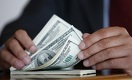 Объем торгов долларом на KASE продолжает сокращаться