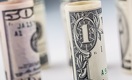 Объем торгов долларом на KASE сократился в два раза