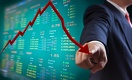 Тенге в среду продолжил значительно обесцениваться к доллару 