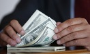 На дневной сессии KASE курс доллара подрос