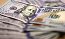 Тенге незначительно укрепился к доллару на дневной сессии KASE