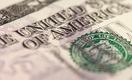 Как реагирует курс доллара на падение нефтяных котировок