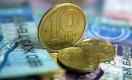 На утренней сессии KASE в понедельник тенге резко укрепился к доллару