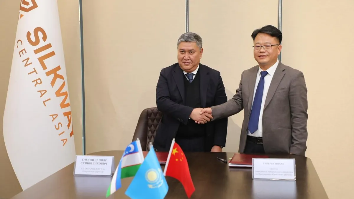   Данияр Тиесов  и Тянь Чжэньхуа, МСЦЛ